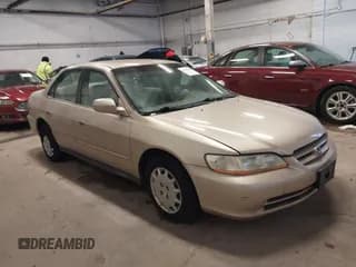 ✅ 2002 Honda Accord LX • VIN: 1HGCG564X2A072418 • Lot: 43905248. Listed on IAAI with 189,031 mi. Free auction sales archive from the USA and detailed vehicle history report at DreamBid. Image 1.