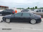 ✅ 2015 Audi A8 4.0T • VIN: WAU32AFD9FN009649 • Lot: 42367874. Wystawiony na IAAI z przebiegiem 138 462 mil. Bezpłatny archiwum sprzedaży aukcyjnych z USA i szczegółowy raport historii pojazdu na DreamBid. Zdjęcie 14.