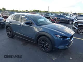 ✅ 2023 Mazda CX-30 S Carbon Edition • VIN: 3MVDMBCM6PM541737 • Lot: 42524854. Listed on IAAI with 55,093 mi. Free auction sales archive from the USA and detailed vehicle history report at DreamBid. Image 1.