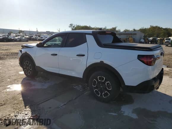 2022 Hyundai Santa Cruz SEL z VIN 5NTJB4AE8NH021237, wystawiony jako Copart lot #85847134 z przebiegiem 69 916 mil mil oraz Szkoda całkowita • Salvage title. Historia ofert i sprzedaży dostępna na DreamBid. Obrazek 2.