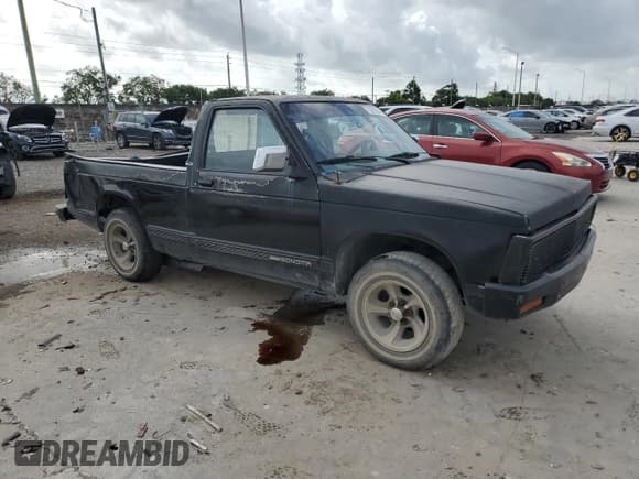 ✅ 1992 GMC Sonoma • VIN: 1GTCS14Z7N8518444 • Lot: 73292294. Wystawiony na Copart z przebiegiem 184 932 mil. Bezpłatny archiwum sprzedaży aukcyjnych z USA i szczegółowy raport historii pojazdu na DreamBid. Zdjęcie 4.