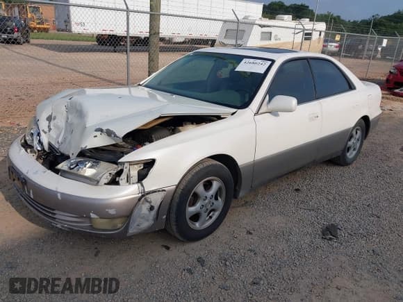 ✅ 1998 Lexus ES 300 • VIN: JT8BF28G2W0131104 • Lot: 42680242. Listed on IAAI with 243,762 mi. Free auction sales archive from the USA and detailed vehicle history report at DreamBid. Image 17.
