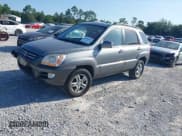 ✅ 2006 Kia Sportage LX • VIN: KNDJF723267292673 • Lot: 42705097. Wystawiony na IAAI z przebiegiem 99 258 mil. Bezpłatny archiwum sprzedaży aukcyjnych z USA i szczegółowy raport historii pojazdu na DreamBid. Zdjęcie 17.