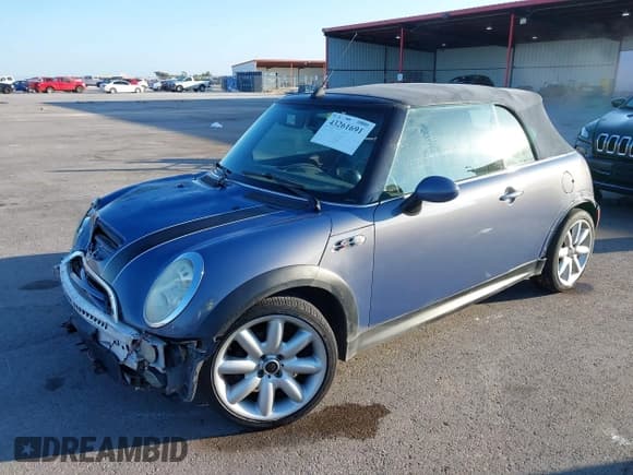 ✅ 2005 MINI Convertible S • VIN: WMWRH33475TF82636 • Lot: 43261691. Listed on IAAI with 127,918 mi. Free auction sales archive from the USA and detailed vehicle history report at DreamBid. Image 18.