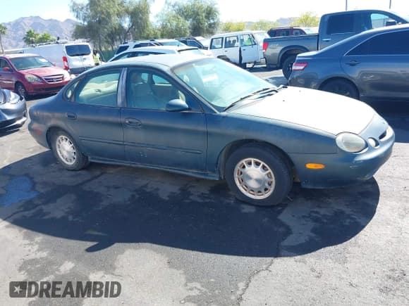 ✅ 1996 Ford Taurus LX • VIN: 1FALP53S0TG125665 • Лот: 42290691. Опубликован ранее на IAAI с пробегом 91 152 миль. Бесплатный доступ к архиву аукционных продаж из США и подробный отчёт об истории автомобиля на DreamBid. Изображение 13.