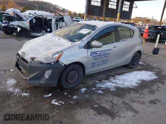 ✅ 2016 Toyota Prius One • VIN: JTDKDTB3XG1137358 • Lot: 43845410. Listed on IAAI with 460,521 mi. Free auction sales archive from the USA and detailed vehicle history report at DreamBid. Image 2.