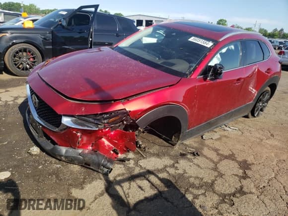 ✅ 2021 Mazda CX-30 Premium • VIN: 3MVDMBDY2MM265585 • Lot: 56051584. Wystawiony na Copart z przebiegiem 20 156 mil. Bezpłatny archiwum sprzedaży aukcyjnych z USA i szczegółowy raport historii pojazdu na DreamBid. Zdjęcie 1.