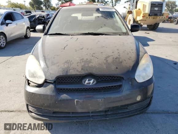 2010 Hyundai Accent GS z VIN KMHCM3AC5AU180741, wystawiony jako Copart lot #70020944 z przebiegiem Nie podano mil oraz Szkoda całkowita • Salvage title. Historia ofert i sprzedaży dostępna na DreamBid. Obrazek 5.