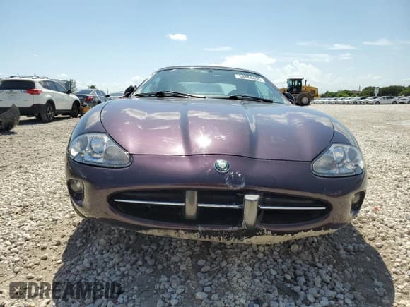 ✅ 1999 Jaguar XK • VIN: SAJGX204XXC034367 • Lot: 58468455. Wystawiony na Copart z przebiegiem 36 246 mil. Bezpłatny archiwum sprzedaży aukcyjnych z USA i szczegółowy raport historii pojazdu na DreamBid. Zdjęcie 5.