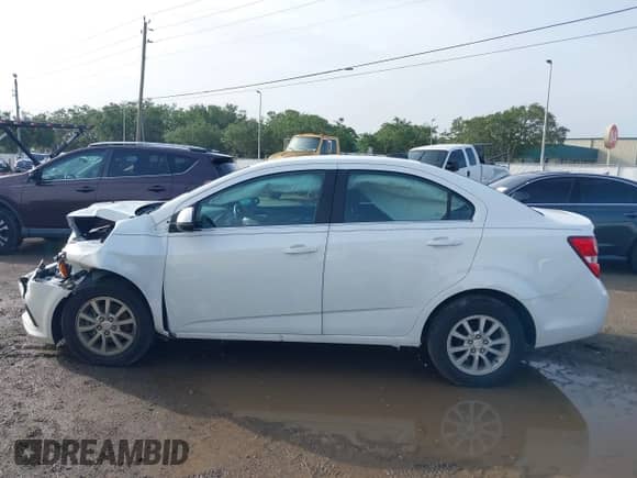 2017 Chevrolet Sonic LT with VIN 1G1JD5SB5H4137193, listed as a IAAI auction lot 42428562 with 52,556 mi miles and . Bid and sale history available at DreamBid. Image 14.