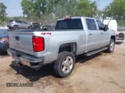 ✅ 2018 Chevrolet Silverado 2500HD Work Truck • VIN: 1GC1KUEG0JF185015 • Lot: 42571720. Listed on IAAI with 185,083 mi. Free auction sales archive from the USA and detailed vehicle history report at DreamBid. Image 4.