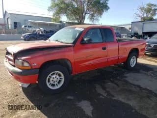 ✅ 1998 Dodge Dakota SLT • VIN: 1B7GL22X4WS693521 • Lot: 61250105. Wystawiony na Copart z przebiegiem 97 534 mil. Bezpłatny archiwum sprzedaży aukcyjnych z USA i szczegółowy raport historii pojazdu na DreamBid. Zdjęcie 1.
