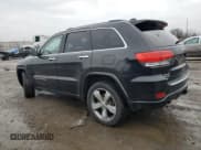 ✅ 2015 Jeep Grand Cherokee Overland • VIN: 1C4RJFCM5FC847707 • Lot: 86420784. Listed on Copart with 124,300 mi. Free auction sales archive from the USA and detailed vehicle history report at DreamBid. Image 2.