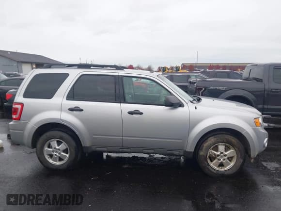 ✅ 2010 Ford Escape XLT • VIN: 1FMCU0DG1AKD17859 • Лот: 43638443. Опубликован ранее на IAAI с пробегом 106 025 миль. Бесплатный доступ к архиву аукционных продаж из США и подробный отчёт об истории автомобиля на DreamBid. Изображение 13.
