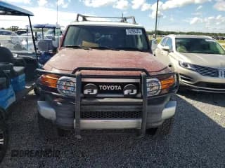 ✅ 2011 Toyota FJ Cruiser • VIN: JTEBU4BF3BK106581 • Lot: 74298474. Listed on Copart with 105,209 mi. Free auction sales archive from the USA and detailed vehicle history report at DreamBid. Image 5.