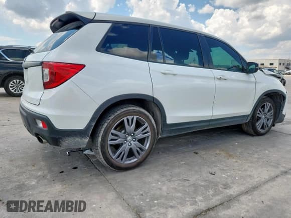 ✅ 2021 Honda Passport EX-L • VIN: 5FNYF7H57MB002751 • Lot: 69928005. Listed on Copart with 47,448 mi. Free auction sales archive from the USA and detailed vehicle history report at DreamBid. Image 3.