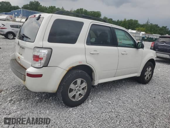 2011 Mercury Mariner z VIN 4M2CN8B71BKJ01749, wystawiony jako Copart lot #64199345 z przebiegiem 157 001 mil mil oraz Szkoda całkowita • Salvage title. Historia ofert i sprzedaży dostępna na DreamBid. Obrazek 3.