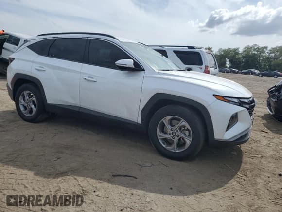 ✅ 2022 Hyundai Tucson SEL • VIN: 5NMJB3AE0NH004812 • Lot: 71742844. Wystawiony na Copart z przebiegiem 77 523 mil. Bezpłatny archiwum sprzedaży aukcyjnych z USA i szczegółowy raport historii pojazdu na DreamBid. Zdjęcie 4.