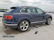 ✅ 2019 Bentley Bentayga V8 • VIN: SJAAM2ZV9KC024691 • Lot: 59217965. Listed on Copart with 33,243 mi. Free auction sales archive from the USA and detailed vehicle history report at DreamBid. Image 3.