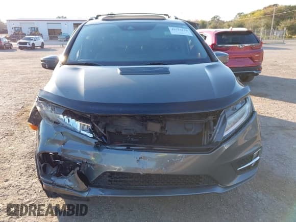 ✅ 2018 Honda Odyssey Elite • VIN: 5FNRL6H95JB014662 • Lot: 43753134. Listed on IAAI with 107,295 mi. Free auction sales archive from the USA and detailed vehicle history report at DreamBid. Image 12.