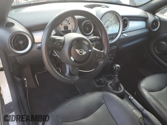 ✅ 2012 MINI Coupe • VIN: WMWSX1C52CT164027 • Lot: 74329124. Listed on Copart with Not provided. Free auction sales archive from the USA and detailed vehicle history report at DreamBid. Image 8.