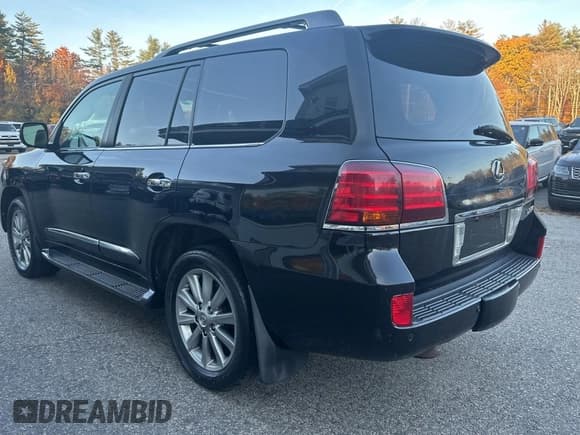 ✅ 2011 Lexus LX 570 • VIN: JTJHY7AX7B4058972 • Lot: 77684774. Listed on Copart with 163,039 mi. Free auction sales archive from the USA and detailed vehicle history report at DreamBid. Image 3.