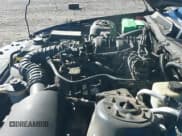 ✅ 2005 Ford Mustang Deluxe • VIN: 1ZVFT80NX55152631 • Lot: 43724918. Listed on IAAI with 123,786 mi. Free auction sales archive from the USA and detailed vehicle history report at DreamBid. Image 14.