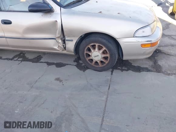 ✅ 1995 Chevrolet Prizm • VIN: 1Y1SK5283SZ021860 • Lot: 43917334. Wystawiony na IAAI z przebiegiem 242 285 mil. Bezpłatny archiwum sprzedaży aukcyjnych z USA i szczegółowy raport historii pojazdu na DreamBid. Zdjęcie 6.