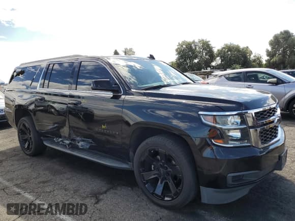✅ 2018 Chevrolet Suburban LS • VIN: 1GNSCGKC0JR392448 • Lot: 81735435. Listed on Copart with 139,751 mi. Free auction sales archive from the USA and detailed vehicle history report at DreamBid. Image 4.