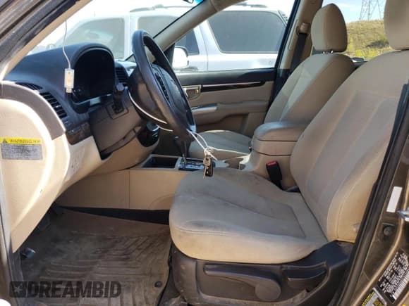 ✅ 2012 Hyundai Santa Fe GLS • VIN: 5XYZGDAB2CG152841 • Lot: 69445724. Listed on Copart with 131,617 mi. Free auction sales archive from the USA and detailed vehicle history report at DreamBid. Image 7.