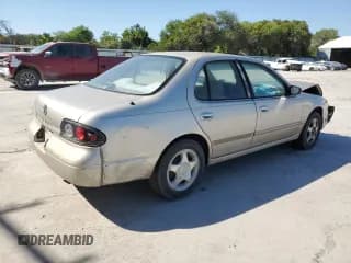 ✅ 1997 Nissan Altima XE • VIN: 1N4BU31D2VC268883 • Lot: 76528444. Listed on Copart with 138,146 mi. Free auction sales archive from the USA and detailed vehicle history report at DreamBid. Image 3.