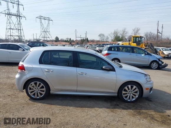 ✅ 2013 Volkswagen Golf TDI w/Sunroof & Nav • VIN: WVWNM7AJ1DW031965 • Lot: 41805349. Wystawiony na IAAI z przebiegiem 184 738 mil. Bezpłatny archiwum sprzedaży aukcyjnych z USA i szczegółowy raport historii pojazdu na DreamBid. Zdjęcie 13.