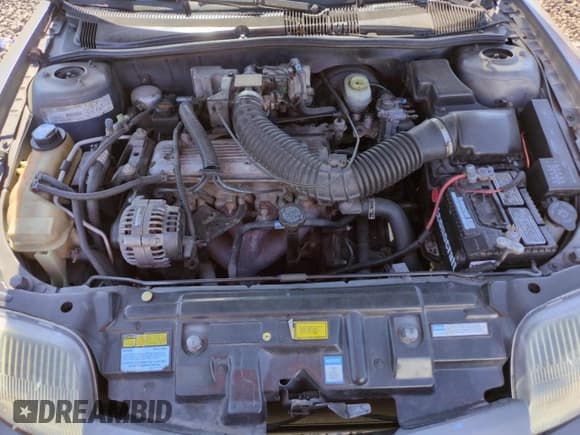 ✅ 1997 Pontiac Sunfire SE • VIN: 1G2JB5246V7600939 • Лот: 59806035. Опубликован ранее на Copart с пробегом 167 618 миль. Бесплатный доступ к архиву аукционных продаж из США и подробный отчёт об истории автомобиля на DreamBid. Изображение 11.