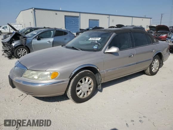 ✅ 2002 Lincoln Continental • VIN: 1LNHM97V32Y647800 • Lot: 75240874. Listed on Copart with 71,689 mi. Free auction sales archive from the USA and detailed vehicle history report at DreamBid. Image 1.