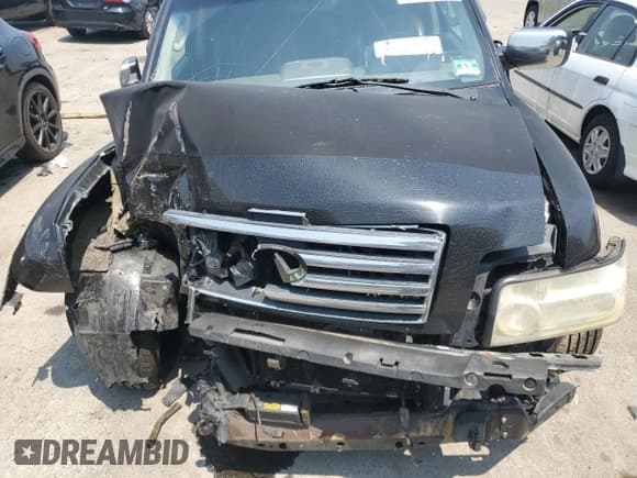 ✅ 2006 Infiniti QX56 • VIN: 5N3AA08C06N812025 • Lot: 60637175. Listed on Copart with Not provided. Free auction sales archive from the USA and detailed vehicle history report at DreamBid. Image 12.