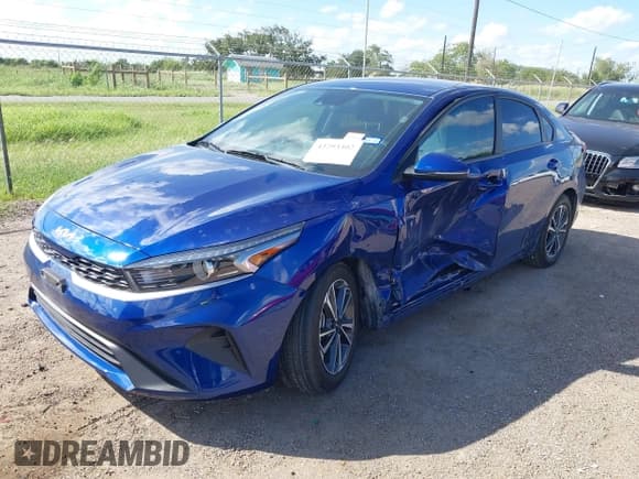 ✅ 2023 Kia Forte LXS • VIN: 3KPF24AD8PE683578 • Lot: 43293302. Listed on IAAI with 14,532 mi. Free auction sales archive from the USA and detailed vehicle history report at DreamBid. Image 17.