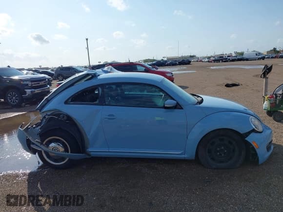 ✅ 2012 Volkswagen Beetle 2.5L • VIN: 3VWJX7AT0CM614269 • Lot: 43772516. Listed on IAAI with 129,147 mi. Free auction sales archive from the USA and detailed vehicle history report at DreamBid. Image 13.