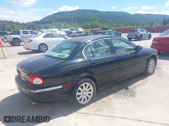 ✅ 2003 Jaguar X-Type 2.5L Manual • VIN: SAJEA51D13XD29839 • Лот: 43072383. Опубликован ранее на IAAI с пробегом 160 247 миль. Бесплатный доступ к архиву аукционных продаж из США и подробный отчёт об истории автомобиля на DreamBid. Изображение 4.