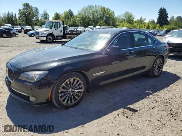 ✅ 2009 BMW 7 Series 750i • VIN: WBAKA83569CY33130 • Lot: 69126755. Listed on Copart with 142,892 mi. Free auction sales archive from the USA and detailed vehicle history report at DreamBid. Image 1.