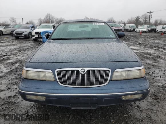 ✅ 1997 Mercury Grand Marquis GS • VIN: 2MELM74W4VX707814 • Lot: 81570244. Wystawiony na Copart z przebiegiem 155 752 mil. Bezpłatny archiwum sprzedaży aukcyjnych z USA i szczegółowy raport historii pojazdu na DreamBid. Zdjęcie 5.