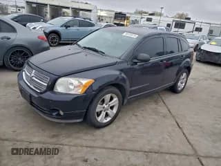 ✅ 2011 Dodge Caliber Mainstreet • VIN: 1B3CB3HA8BD163319 • Lot: 96125915. Listed on Copart with 180,384 mi. Free auction sales archive from the USA and detailed vehicle history report at DreamBid. Image 1.