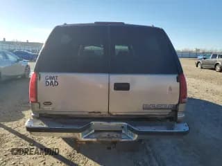 ✅ 1999 Chevrolet Suburban • VIN: 1GNFK16R6XJ448528 • Lot: 79539034. Wystawiony na Copart z przebiegiem 291 154 mil. Bezpłatny archiwum sprzedaży aukcyjnych z USA i szczegółowy raport historii pojazdu na DreamBid. Zdjęcie 6.