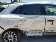 ✅ 2015 Lincoln MKC • VIN: 5LMCJ1A94FUJ22822 • Lot: 70714825. Listed on Copart with 146,500 mi. Free auction sales archive from the USA and detailed vehicle history report at DreamBid. Image 11.