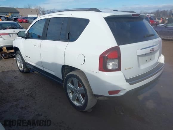 ✅ 2014 Jeep Compass High Altitude • VIN: 1C4NJCEAXED889721 • Лот: 41452426. Опубликован ранее на IAAI с пробегом 94 573 миль. Бесплатный доступ к архиву аукционных продаж из США и подробный отчёт об истории автомобиля на DreamBid. Изображение 3.