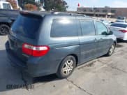 ✅ 2005 Honda Odyssey EX-L • VIN: 5FNRL386X5B412931 • Лот: 43783380. Опубликован ранее на IAAI с пробегом 142 253 миль. Бесплатный доступ к архиву аукционных продаж из США и подробный отчёт об истории автомобиля на DreamBid. Изображение 4.