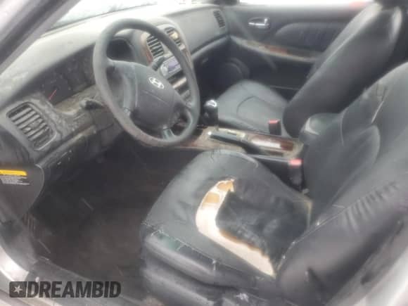 2003 Hyundai Sonata GLS с VIN KMHWF35H33A824982, выставлен на аукционе Copart как лот 84104904 с пробегом Не указан миль и Списание • Salvage title. История ставок и продаж доступна на DreamBid. Изображение 7.