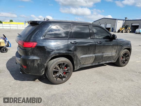 ✅ 2017 Jeep Grand Cherokee • VIN: NCS108376 • Lot: 57158405. Listed on Copart with 101,442 mi. Free auction sales archive from the USA and detailed vehicle history report at DreamBid. Image 3.