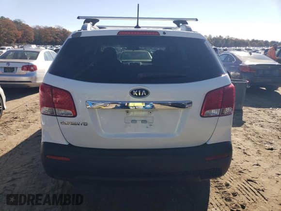 ✅ 2013 Kia Sorento LX • VIN: 5XYKTDA26DG338347 • Лот: 91383575. Опубликован ранее на Copart с пробегом 151 795 миль. Бесплатный доступ к архиву аукционных продаж из США и подробный отчёт об истории автомобиля на DreamBid. Изображение 6.