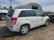 ✅ 2013 Suzuki Grand Vitara Premium • VIN: JS3TE0D62D4100310 • Lot: 54916065. Listed on Copart with 116,428 mi. Free auction sales archive from the USA and detailed vehicle history report at DreamBid. Image 3.