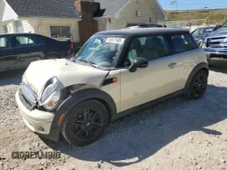 2009 MINI Hardtop with VIN WMWMF33579TW79914, listed as a Copart auction lot 84977505 with 119,188 mi miles and Salvage title. Bid and sale history available at DreamBid. Image 1.